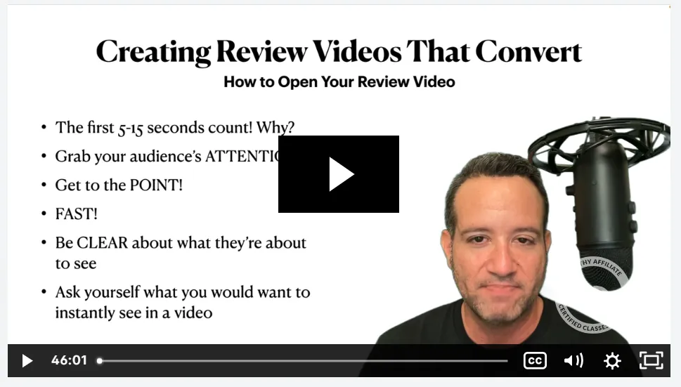 A man is sitting in front of a microphone with a cityscape in the background. He is wearing a black shirt and has a serious expression on his face. He is looking at the camera. There is a slide presentation projected behind him that says "Creating Review Videos That Convert." There are several bullet points listed, including "The first 5-15 seconds count!", "Get to the point!", and "Be clear about what they're about to see."