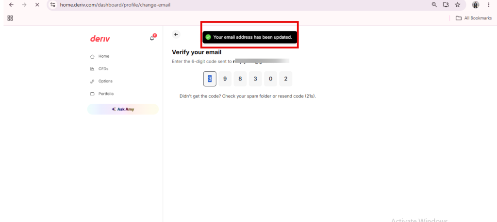 A web page displays an email verification form with a notification at the top stating, “Your email address has been updated.” A six-digit code entry field is visible, allowing you to complete the Deriv email verification process as part of your Deriv account settings email update.